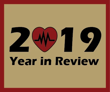 The year 2019 with the zero in the shape of a heart with a heart rate line inside.